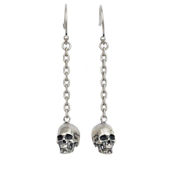 Sterling silver skull earrings with pendant design
