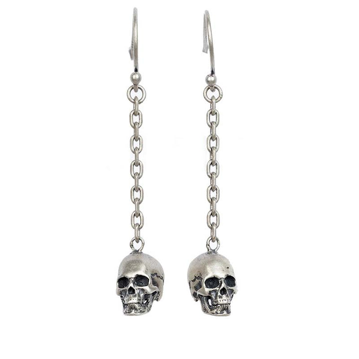 Sterling silver skull earrings with pendant design

