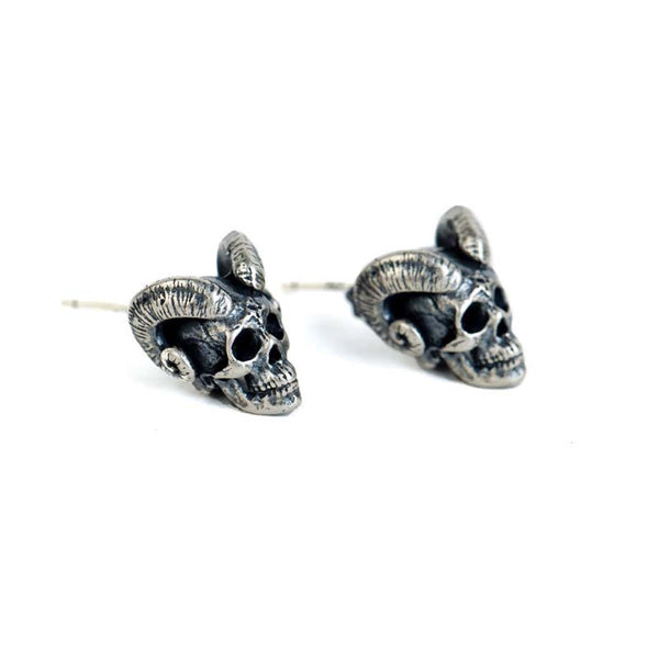 Gothic Demon Satan earrings styled as bold silver jewelry