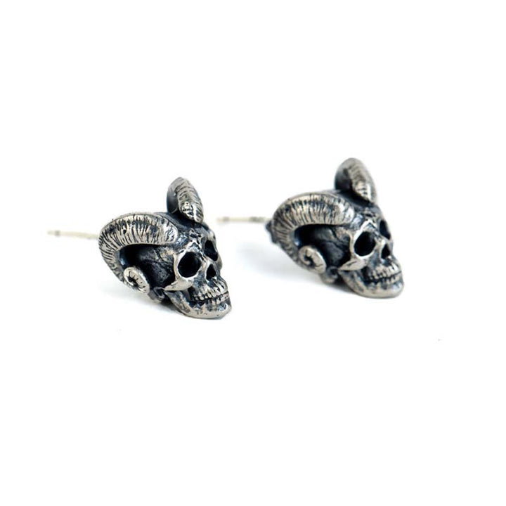 Gothic Demon Satan earrings styled as bold silver jewelry